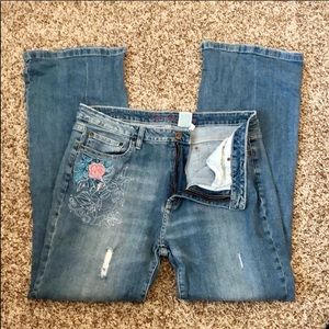 Light blue jeans with pink flower